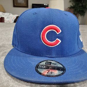 New Era 59 Fifty Chicago Cubs fitted hat 7 1/8, color blue, used good condition.